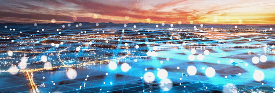 Eine weitläufige Stadtlandschaft mit digital leuchtenden blauen Linien und Punkten, die die digitale Vernetzung symbolisieren.